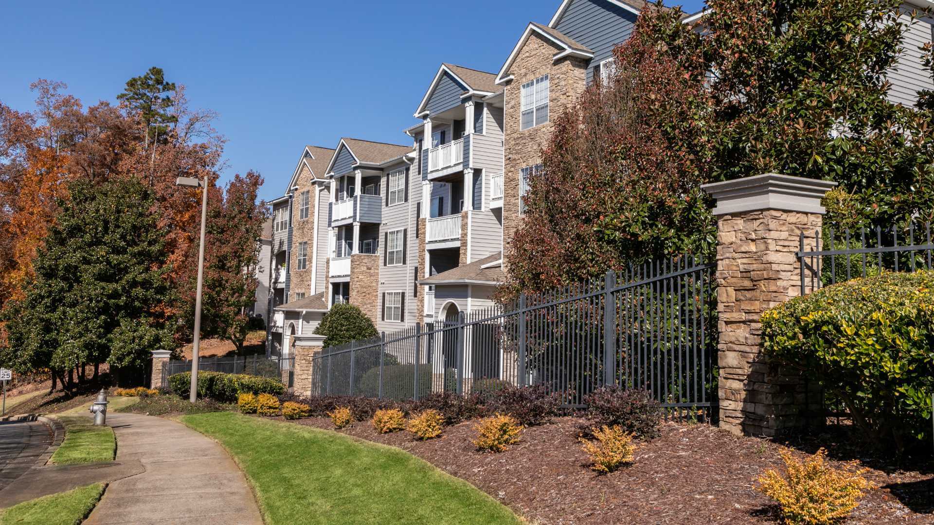 walkway alongside Halston Shiloh Valley apartment homes buildings